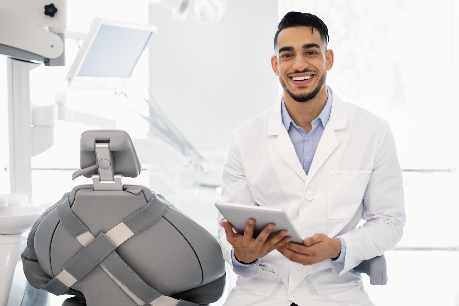 modern-dentistry-portrait-of-young-arab-stomatolo-2025-03-18-19-00-59-utc.jpg